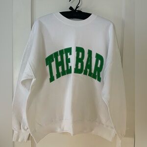 The Bar Men's/Women’s Crewneck Sweatshirt in White with Green Logo